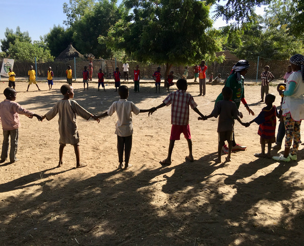 Children holding hands