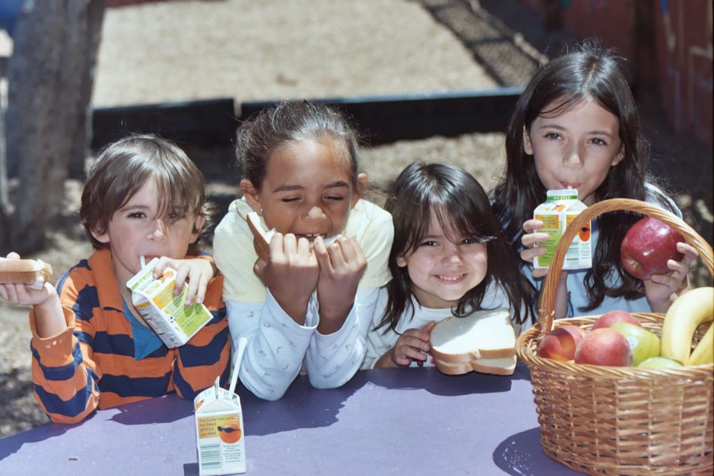 Westside Food Bank children eating